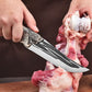 Bone cutting knife with dragon decoration and sheath.