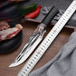 Bone cutting knife with dragon decoration and sheath.